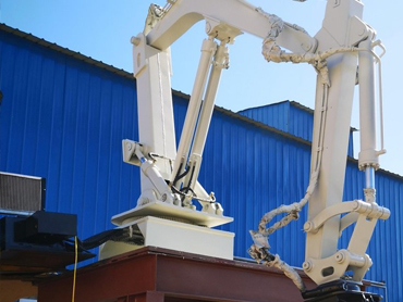 Primjena lijevanja manipulator ispred peći